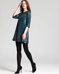 Glamorous, gleaming paillettes embellish this party-perfect French Connection dress with color and sparkle for a night on the town.