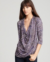A stylishly draped cowl neck and mesmerizing snake print raise elevate the wow factor of this Soft Joie top. A stylishly draped cowl neck and mesmerizing snake print raise elevate the wow factor of this Soft Joie top.