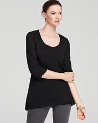 Brimming with urban flair, this Miraclebody by Miraclesuit top flaunts a chic trapeze silhouette for a modern statement. Brimming with urban flair, this Miraclebody by Miraclesuit top flaunts a chic trapeze silhouette for a modern statement.