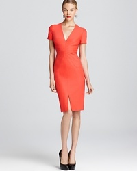 A vibrant Zac Posen dress flaunts sleek lines and and unique starburst seam detail in the designer's signature standout style. A vibrant Zac Posen dress flaunts sleek lines and and unique starburst seam detail in the designer's signature standout style.