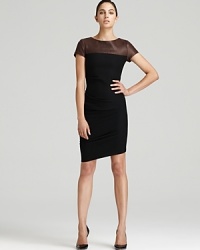 Sleek leather punctuates a Halston Heritage sheath dress, finished with an uneven hem for a contemporary approach to the classic silhouette. Team with monochrome accents for a clean modern look. Sleek leather punctuates a Halston Heritage sheath dress, finished with an uneven hem for a contemporary approach to the classic silhouette. Team with monochrome accents for a clean modern look.