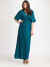 A simple-yet-elegant design with just the right amount of stretch for a divine fit.V-neckShort sleevesElasticized Empire waistPull-on styleAbout 42 from natural waist48% rayon/42% polyester/10% spandexDry cleanMade in USA of imported fabric A simple-yet-elegant design with just the right amount of stretch for a divine fit.V-neckShort sleevesElasticized Empire waistPull-on styleAbout 42 from natural waist48% rayon/42% polyester/10% spandexDry cleanMade in USA of imported fabric