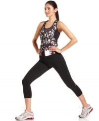 Energize your workout routine with a dose of style, from Ideology. These capri active pants are perfect for working out and feature a chic printed waistband for a little fun!