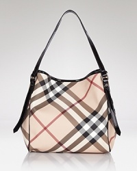 Finish your look with Burberry's luxe tote in the brand's classic, coveted check print.