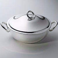 Vertigo is a modern silver holloware collection for your table. The vegetable dish is a perfect compliment to other Vertigo collections including: table accessories; barware; three piece server; trays; and coffee service. Shown here is the covered vegetable dish. Vertigo is a modern silver holloware collection for your table. The vegetable dish is a perfect compliment to other Vertigo collections including: table accessories; barware; three piece server; trays; and coffee service. Shown here is the covered vegetable dish.