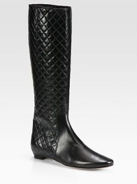 Luxurious quilting defines this tall silhouette, expertly crafted of supple Italian leather. Shaft, 15¾Leg circumference, 13Leather upperPull-on styleLeather lining and solePadded insoleMade in Italy Luxurious quilting defines this tall silhouette, expertly crafted of supple Italian leather. Shaft, 15¾Leg circumference, 13Leather upperPull-on styleLeather lining and solePadded insoleMade in Italy