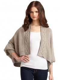 THE LOOKDraped open frontCable-knit edgesRibbed cuffs and hemDolman sleevesTHE FITAbout 23 from shoulder to longest point of hemTHE MATERIALCashmereCARE & ORIGINDry cleanImportedModel shown is 5'9½ (176cm) wearing US size Small. THE LOOKDraped open frontCable-knit edgesRibbed cuffs and hemDolman sleevesTHE FITAbout 23 from shoulder to longest point of hemTHE MATERIALCashmereCARE & ORIGINDry cleanImportedModel shown is 5'9½ (176cm) wearing US size Small.