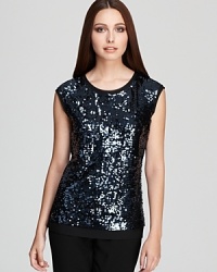Dripping with decadent sequins, this Calvin Klein shell flaunts a trend-right ombre motif, lending fluid dimension to your every look. Dripping with decadent sequins, this Calvin Klein shell flaunts a trend-right ombre motif, lending fluid dimension to your every look.