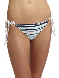 THE LOOKTwo-tone brushstroke wave patternElastic waist and leg openingsSide ties with O-ringsTHE MATERIAL80% nylon/20% spandexCARE & ORIGINHand washMade in USA of imported fabricPlease note: Bikini top sold separately. 