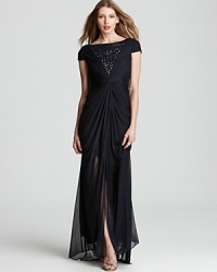 Adrianna Papell's sophisticated, gathered gown features covered, jeweled details for understated sparkle. A knotted waist creates graceful draping. Adrianna Papell's sophisticated, gathered gown features covered, jeweled details for understated sparkle. A knotted waist creates graceful draping.