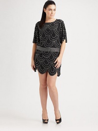 Short and sparkling, this pure silk design is lavished with crystal beads in graceful scallop patterns that mirror the scallop-shaped hem and sleeves.Ballerina necklineShort scallop-hem sleevesStraight shape with crystal belt at waistScallop hemSide zip closureSilk liningAbout 36 from shoulder to hemSilkHand washImported Short and sparkling, this pure silk design is lavished with crystal beads in graceful scallop patterns that mirror the scallop-shaped hem and sleeves.Ballerina necklineShort scallop-hem sleevesStraight shape with crystal belt at waistScallop hemSide zip closureSilk liningAbout 36 from shoulder to hemSilkHand washImported