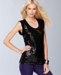 Sparkle on in INC's surprisingly versatile sequin petite top. It looks as chic with colored jeans as it does with a pencil skirt. Sparkle on in INC's surprisingly versatile sequin petite top. It looks as chic with colored jeans as it does with a pencil skirt.