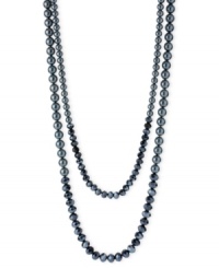 Classic elegance. This two-row necklace from Kenneth Cole New York is crafted from silver-tone mixed metal with navy glass pearls and beads combining for a stunning look. Approximate length: 31 inches + 3-inch extender. Item comes packaged in a signature Kenneth Cole New York Gift Box. Approximate drop: 2-1/2 inches.