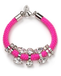 Crystal stones dress up a twisted neon cord on this bracelet from nOir. Equal parts crafty and cool, it instantly adds summer-perfect sparkle to your arm army. Crystal stones dress up a twisted neon cord on this bracelet from nOir. Equal parts crafty and cool, it instantly adds summer-perfect sparkle to your arm army.