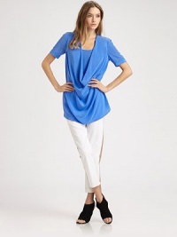 Sumptuous washed crepe-de-chine, elegantly draped in an elongated tie-back tunic.ScoopneckShort sleevesDraped frontTie backAbout 31 from shoulder to hemSilkDry cleanImportedModel shown is 5'9½ (176cm) wearing US size 4. Sumptuous washed crepe-de-chine, elegantly draped in an elongated tie-back tunic.ScoopneckShort sleevesDraped frontTie backAbout 31 from shoulder to hemSilkDry cleanImportedModel shown is 5'9½ (176cm) wearing US size 4.