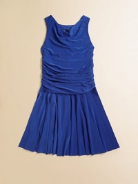 Party time or picture perfect, this flouncy, shirred frock is sure to make a statement.CowlneckSleevelessBack zipperShirred bodiceFull skirtFully lined92% polyester/8% spandexHand wash coldMade in the USA of imported fabric Party time or picture perfect, this flouncy, shirred frock is sure to make a statement.CowlneckSleevelessBack zipperShirred bodiceFull skirtFully lined92% polyester/8% spandexHand wash coldMade in the USA of imported fabric