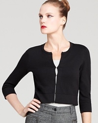 Dressed down with denim or slipped over sparkly frocks, this Lilly Pulitzer cardigan flaunts a chic, cropped silhouette for limitless layering possibilities. Dressed down with denim or slipped over sparkly frocks, this Lilly Pulitzer cardigan flaunts a chic, cropped silhouette for limitless layering possibilities.