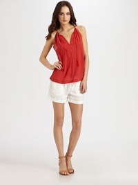 Luxe, lightweight cotton v-neck has tassel tights and a trend-right racerback. V-neck with tassel tiesSpaghetti strapsRacerbackCottonHand washImportedModel shown is 5'10 (177cm) wearing US size Small. Luxe, lightweight cotton v-neck has tassel tights and a trend-right racerback. V-neck with tassel tiesSpaghetti strapsRacerbackCottonHand washImportedModel shown is 5'10 (177cm) wearing US size Small.