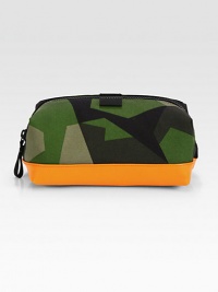 If Rambo ever needed a dopp kit for his moisterizing regime, this is it. Water resistant inside and out, this geometric camo travel kit is dipped in laytex for added durability.Zip closureNylon4W X 10H X 5DImported If Rambo ever needed a dopp kit for his moisterizing regime, this is it. Water resistant inside and out, this geometric camo travel kit is dipped in laytex for added durability.Zip closureNylon4W X 10H X 5DImported
