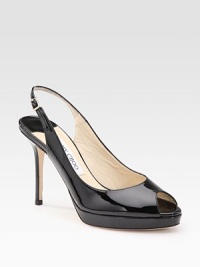 From the 24:7 Collection. High shine, high style, a modern classic in sleek patent leather. Self-covered heel, 4 (100mm) Covered platform, ¾ (20mm) Compares to a 3¼ heel (80mm) Peep toe Adjustable strap Leather lining and sole Made in ItalyOUR FIT MODEL RECOMMENDS ordering true size.. From the 24:7 Collection. High shine, high style, a modern classic in sleek patent leather. Self-covered heel, 4 (100mm) Covered platform, ¾ (20mm) Compares to a 3¼ heel (80mm) Peep toe Adjustable strap Leather lining and sole Made in ItalyOUR FIT MODEL RECOMMENDS ordering true size..
