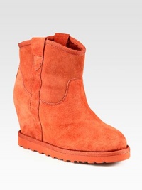 Practical and fashion-forward suede boot, lined with shearling and heightened by a hidden wedge. Suede-covered heel, 3½ (90mm)Rubber platform, ¾ (20mm)Compares to a 2¾ heel (70mm)Shaft, 7Leg circumference, 11Suede upper with grosgrain trimPull-on styleShearling liningRubber solePadded insoleImported Practical and fashion-forward suede boot, lined with shearling and heightened by a hidden wedge. Suede-covered heel, 3½ (90mm)Rubber platform, ¾ (20mm)Compares to a 2¾ heel (70mm)Shaft, 7Leg circumference, 11Suede upper with grosgrain trimPull-on styleShearling liningRubber solePadded insoleImported
