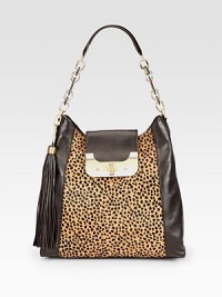 A beautiful leopard print hair calf panel with supple leather sides in a roomy carryall design.Leather and chain shoulder strap, 9 dropTurnlock strap closureDetachable tassel accentTwo outside open pockets, one under strap and one on backOne inside zip pocketTwo inside open pocketsOne pen holderFully lined13W X 12¾H X 4DImported A beautiful leopard print hair calf panel with supple leather sides in a roomy carryall design.Leather and chain shoulder strap, 9 dropTurnlock strap closureDetachable tassel accentTwo outside open pockets, one under strap and one on backOne inside zip pocketTwo inside open pocketsOne pen holderFully lined13W X 12¾H X 4DImported
