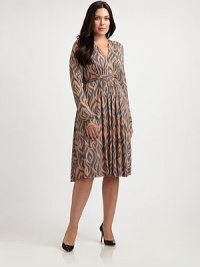 Simple-yet-stunning, this jersey dress with a hint of stretch features a waist-defining self-tie detail. You will love the attention its striking print garners.V-necklineLong sleevesPull-on styleAllover printSelf-tie detail at waistAbout 30 from natural waist92% modal/8% spandexDry cleanMade in USA Simple-yet-stunning, this jersey dress with a hint of stretch features a waist-defining self-tie detail. You will love the attention its striking print garners.V-necklineLong sleevesPull-on styleAllover printSelf-tie detail at waistAbout 30 from natural waist92% modal/8% spandexDry cleanMade in USA