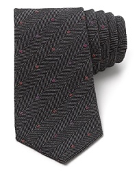 The herringbone pattern provides an unexpected but classic background for the colored dots that run across the front of this super-cool tie from Paul Smith, crafted in soft wool for a unique material presence. The herringbone pattern provides an unexpected but classic background for the colored dots that run across the front of this super-cool tie from Paul Smith, crafted in soft wool for a unique material presence.