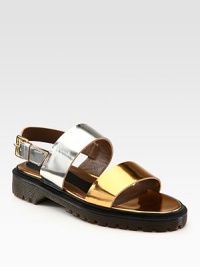 Comfortable silhouette featuring luminous metallic leather bands in contrasting tones and a rubber trek sole. Rubber platform, 1¼ (30mm)Metallic leather upperAdjustable slingback strapLeather liningRubber trek solePadded insoleMade in Italy Comfortable silhouette featuring luminous metallic leather bands in contrasting tones and a rubber trek sole. Rubber platform, 1¼ (30mm)Metallic leather upperAdjustable slingback strapLeather liningRubber trek solePadded insoleMade in Italy
