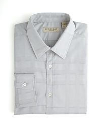 Strike a modern look with this choice dress shirt from Burberry, tailored in a contemporary fit for a trim silhouette and patterned with a subtle tonal check pattern all over. Strike a modern look with this choice dress shirt from Burberry, tailored in a contemporary fit for a trim silhouette and patterned with a subtle tonal check pattern all over.