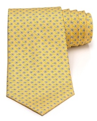 A silk tie adds distinction and flair to your formal presentation. With a repeating pattern of flowers, you'll also punch up your attire with a bit of handsome elegance. A silk tie adds distinction and flair to your formal presentation. With a repeating pattern of flowers, you'll also punch up your attire with a bit of handsome elegance.