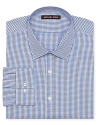 An upbeat yet totally traditional check shirt performs admirably in your workweek rotation and makes a nice variation from your solid button-downs. An upbeat yet totally traditional check shirt performs admirably in your workweek rotation and makes a nice variation from your solid button-downs.
