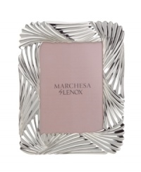 With gorgeous pleating in polished silver plate, the Pleated Swirl picture frame drapes beautiful places and people in exquisite Marchesa by Lenox style. With gorgeous pleating in polished silver plate, the Pleated Swirl picture frame drapes beautiful places and people in exquisite Marchesa by Lenox style.