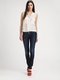 Ultra-stretchy and soft, these faded denim skinnies hug your curves like second skin.THE FITRise, about 7Inseam, about 32THE DETAILSZip flyFive-pocket styleSignature stitch back flap pockets97% cotton/3% LycraMachine washMade in USA of imported fabricModel shown is 5'9 (175cm) wearing US size 4. Ultra-stretchy and soft, these faded denim skinnies hug your curves like second skin.THE FITRise, about 7Inseam, about 32THE DETAILSZip flyFive-pocket styleSignature stitch back flap pockets97% cotton/3% LycraMachine washMade in USA of imported fabricModel shown is 5'9 (175cm) wearing US size 4.