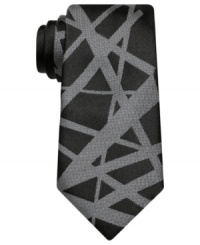 With an evocative pattern, this skinny tie from Bar III gives added edge to the modern man's dress wardrobe. With an evocative pattern, this skinny tie from Bar III gives added edge to the modern man's dress wardrobe.