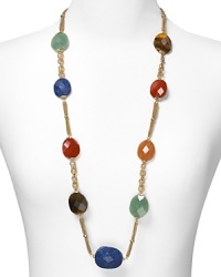Brighten up your neckline with this faceted illusion style from Carolee, flaunting a chunky-chic mix of carnelian, jade, lapis, tiger's eye, and jasper stones. Brighten up your neckline with this faceted illusion style from Carolee, flaunting a chunky-chic mix of carnelian, jade, lapis, tiger's eye, and jasper stones.
