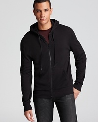 Reach for this comfortable hoodie when the wind picks up for a cozy layer in super-soft cotton, featuring front rib detail for extra flair. Reach for this comfortable hoodie when the wind picks up for a cozy layer in super-soft cotton, featuring front rib detail for extra flair.