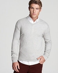 A lightweight sweater from Theory works in the office and after hours, perfect with a handsome button-down. A lightweight sweater from Theory works in the office and after hours, perfect with a handsome button-down.