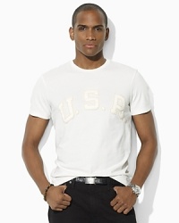A trim-fitting cotton jersey T-shirt embraces both comfort and classic vintage style with a tonal USA patch at the chest. A trim-fitting cotton jersey T-shirt embraces both comfort and classic vintage style with a tonal USA patch at the chest.