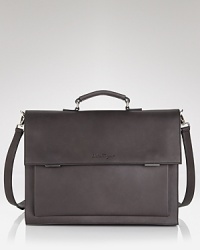 This exceptionally innovative brief from the always masterful Salvatore Ferragamo will exceed your expectations. Three interior gussets expand for additional storage space, providing 4 organizational compartments. Plus, the gussets double as zip pockets for even more storage capacity. The brief quickly converts to a backpack, perfect for traveling, especially when you're on a tight schedule or between connections. Crafted in premium Italian leather with a contrast plum interior, this brief offers the height of luxury and design. This exceptionally innovative brief from the always masterful Salvatore Ferragamo will exceed your expectations. Three interior gussets expand for additional storage space, providing 4 organizational compartments. Plus, the gussets double as zip pockets for even more storage capacity. The brief quickly converts to a backpack, perfect for traveling, especially when you're on a tight schedule or between connections. Crafted in premium Italian leather with a contrast plum interior, this brief offers the height of luxury and design.