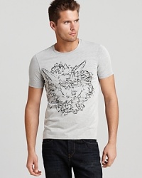 An abstract graphic fronts this uber-cool hangout tee, perfect with a pair of edgy jeans. An abstract graphic fronts this uber-cool hangout tee, perfect with a pair of edgy jeans.