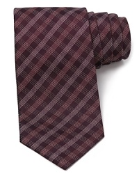 A vintage inspired piece from Armani Collezioni sparks your professional look with classic verve. A vintage inspired piece from Armani Collezioni sparks your professional look with classic verve.