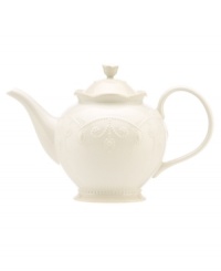With fanciful beading and a feminine edge, this Lenox French Perle teapot is a great addition to your white dinnerware and has an irresistibly old-fashioned sensibility. Hard-wearing stoneware is dishwasher safe and, in a soft white hue, a graceful addition to any meal. With fanciful beading and a feminine edge, this Lenox French Perle teapot is a great addition to your white dinnerware and has an irresistibly old-fashioned sensibility. Hard-wearing stoneware is dishwasher safe and, in a soft white hue, a graceful addition to any meal.