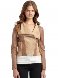 THE LOOKAsymmetrical concealed zip closureStand collarSlash side pocketsLong sleevesPerforated suede panels at front, arms and sidesTHE FITAbout 19 from shoulder to hemCroppedTHE MATERIALLeatherCARE & ORIGINDry clean by a leather specialistImportedOUR FIT MODEL RECOMMENDS ordering one size up as this style runs small. THE LOOKAsymmetrical concealed zip closureStand collarSlash side pocketsLong sleevesPerforated suede panels at front, arms and sidesTHE FITAbout 19 from shoulder to hemCroppedTHE MATERIALLeatherCARE & ORIGINDry clean by a leather specialistImportedOUR FIT MODEL RECOMMENDS ordering one size up as this style runs small.