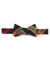 Pep up your look with a preppy Tartan plaid bow tie, clever and colorful anywhere you go. Pep up your look with a preppy Tartan plaid bow tie, clever and colorful anywhere you go.