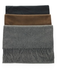 Add a touch of polish to your outerwear with this wear-everywhere solid fringe scarf from John Ashford. Add a touch of polish to your outerwear with this wear-everywhere solid fringe scarf from John Ashford.