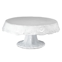 Handmade and inspired by the maestro artisan's family heirloom dinnerware, this distressed white oval platter makes an elegant display for cakes and pies. Handmade and inspired by the maestro artisan's family heirloom dinnerware, this distressed white oval platter makes an elegant display for cakes and pies.