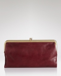 A sleek, chic wallet, Hobo's hardware-trimmed style comes crafted in rich leather and thoughtfully organized with a bevy of pockets.. A sleek, chic wallet, Hobo's hardware-trimmed style comes crafted in rich leather and thoughtfully organized with a bevy of pockets..