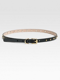 Solid leather belt with eye-catching stud accents and logo-engraved, antique gold buckle.About .6 wideMade in Italy Solid leather belt with eye-catching stud accents and logo-engraved, antique gold buckle.About .6 wideMade in Italy