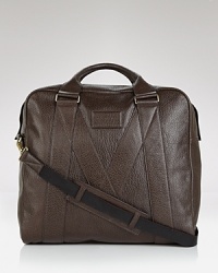 Stow a change of clothes and that novel you've been itching to read inside this refined leather holdall, designed with a subtle, stitched M on the exterior for a signature designer touch, perfect for a trip out of town. From MARC BY MARC JACOBS. Stow a change of clothes and that novel you've been itching to read inside this refined leather holdall, designed with a subtle, stitched M on the exterior for a signature designer touch, perfect for a trip out of town. From MARC BY MARC JACOBS.
